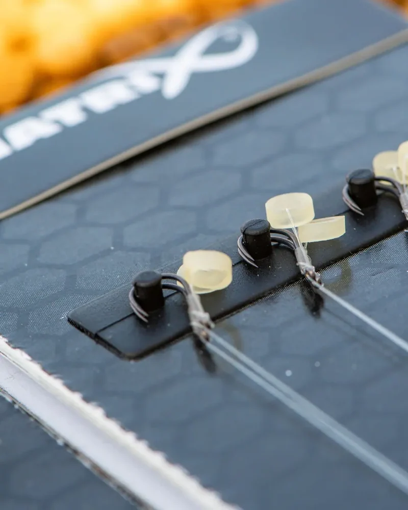 X5 F1 Pellet Rigger Band Rigs 4" Barbless – 10 cm Onderlijnen met Bait Band en Zonder Weerhaak (8 stuks)