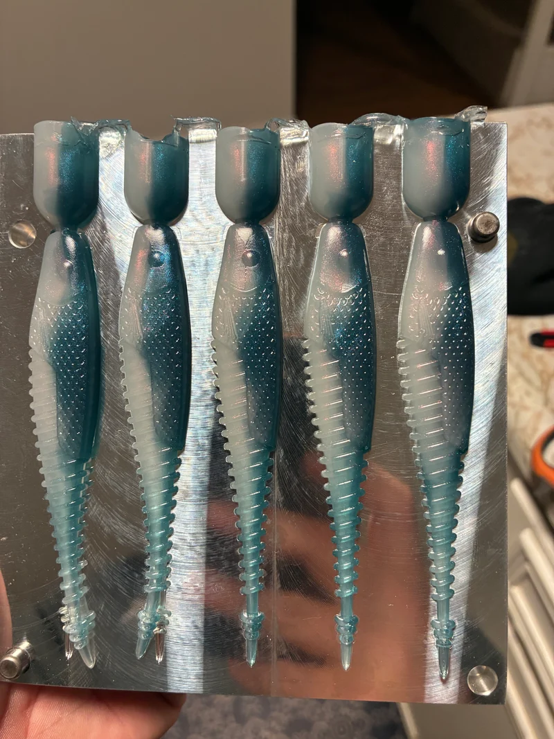 4.25in “Free Money Minnow” Pro Blue Red Pearl 5 in a bag.
